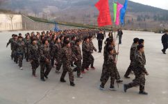 云顶国际yd888助力章丘健民连锁大药房管理干部军事拓展训练营